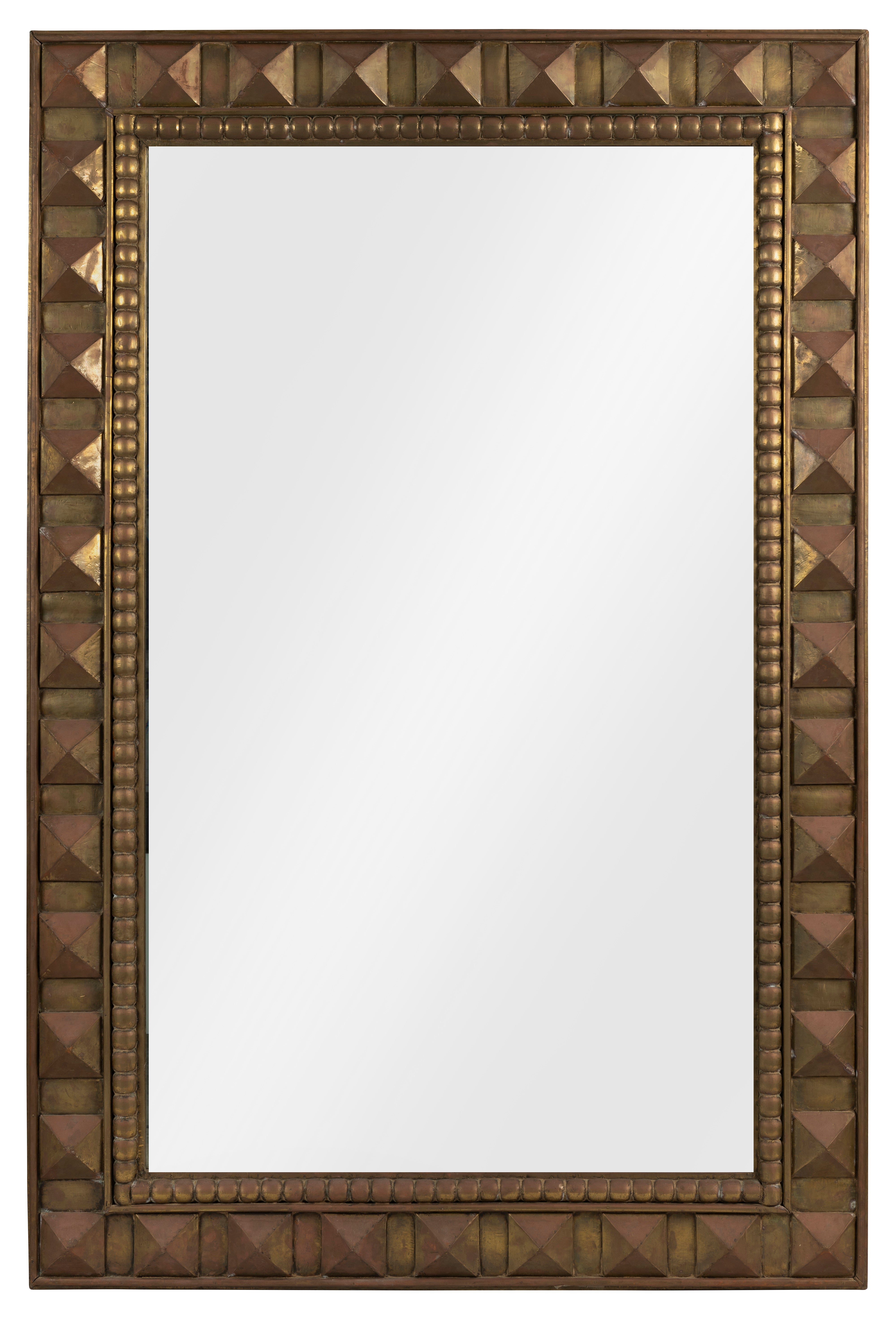 A Pressed Metal Overlay Geometric Mirror