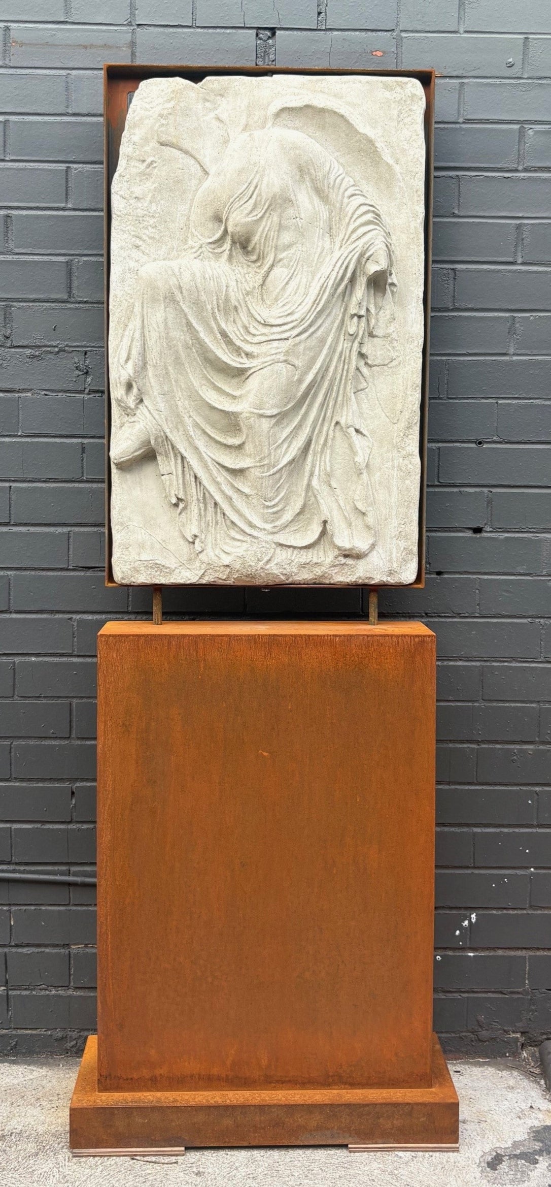 A Stone Composite Nike Plaque