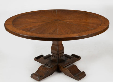 A Round Sunburst Dining Table