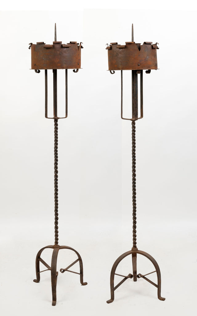 A Pair of Hand Wrought Iron Candle stands.