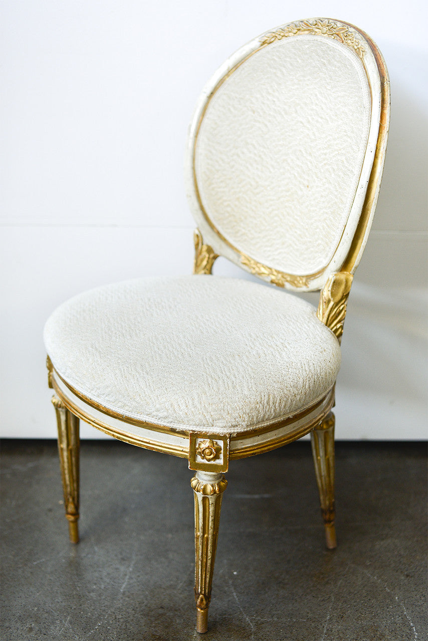 A Set of Twelve Antique Italian Louis XVI Painted and Parcel Gilt Dining Chairs