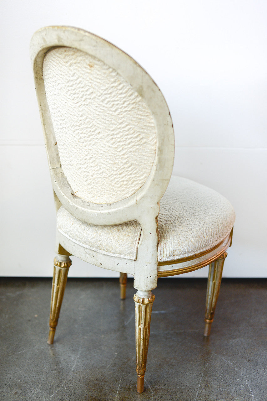 A Set of Twelve Antique Italian Louis XVI Painted and Parcel Gilt Dining Chairs