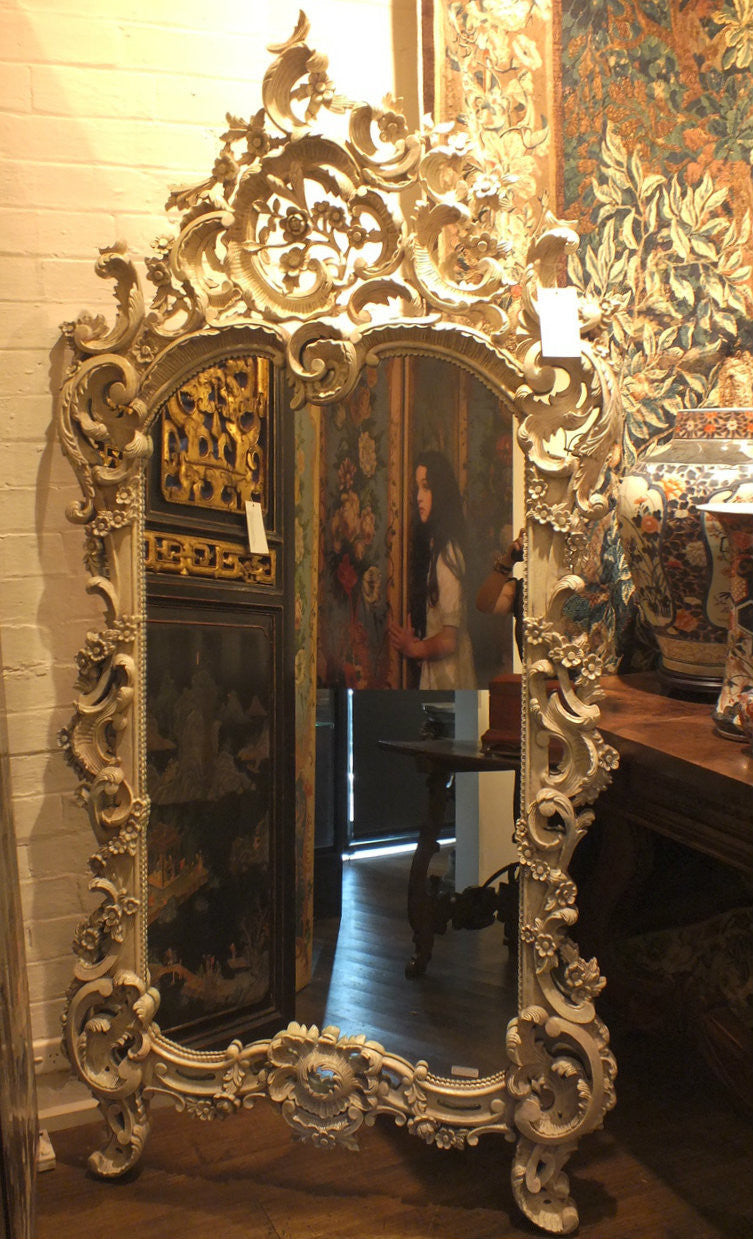 An Ornate Leaf Scroll Carved Louis XV Style Giltwood Mirror