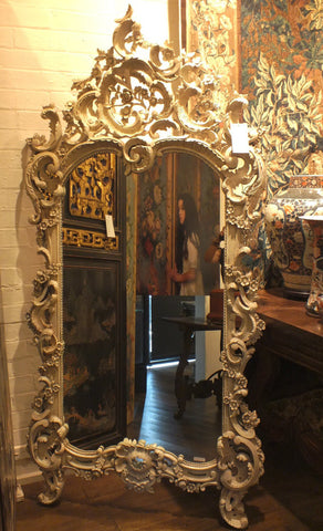 An Ornate Leaf Scroll Carved Louis XV Style Giltwood Mirror