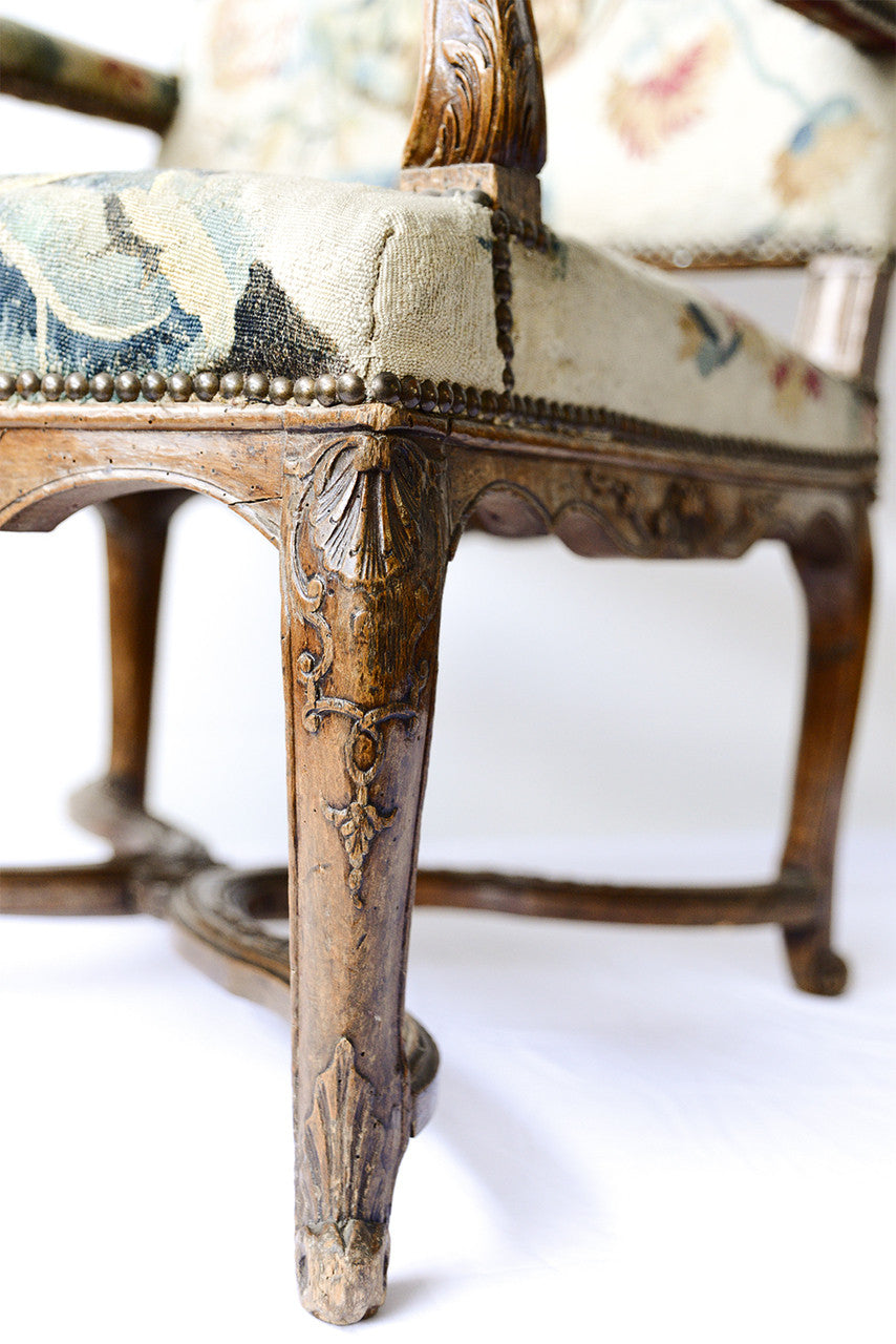 A Pair of Louis XV Walnut Framed Armchairs