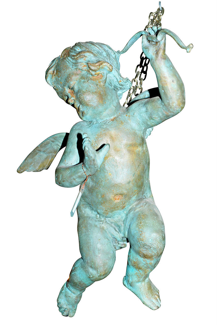 A Pair of Classical Style Bronze Cherub Figures