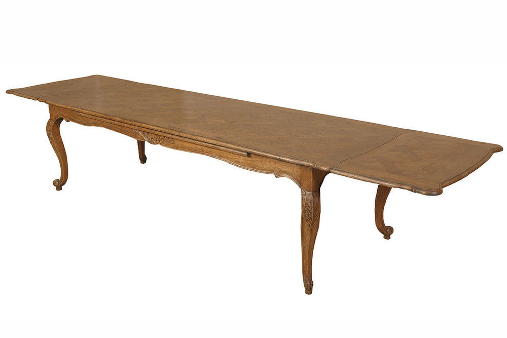 A French Provincial Style Dining Table with Parquetry Top