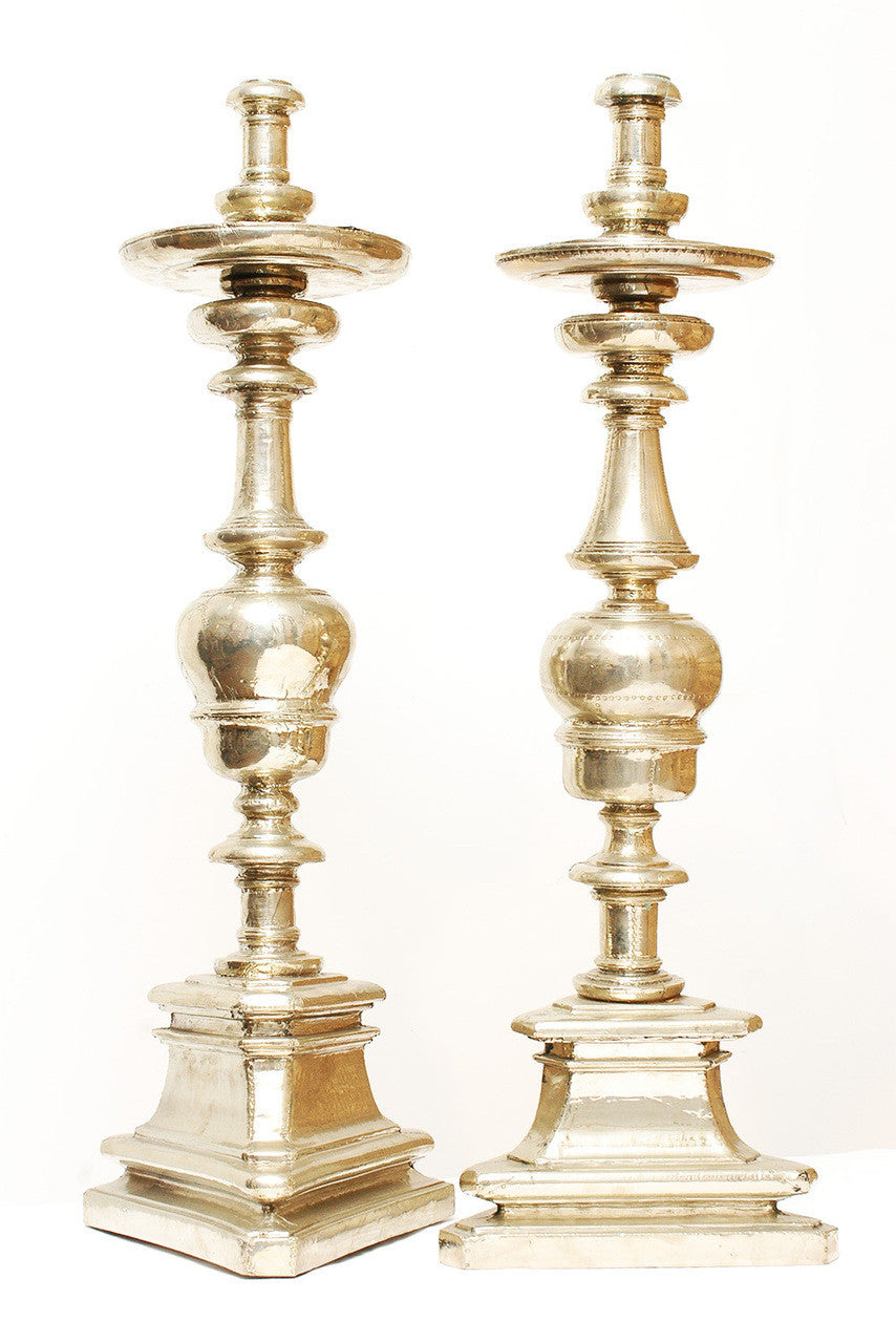 A Pair of Silver Foil Overlaid Torcheres