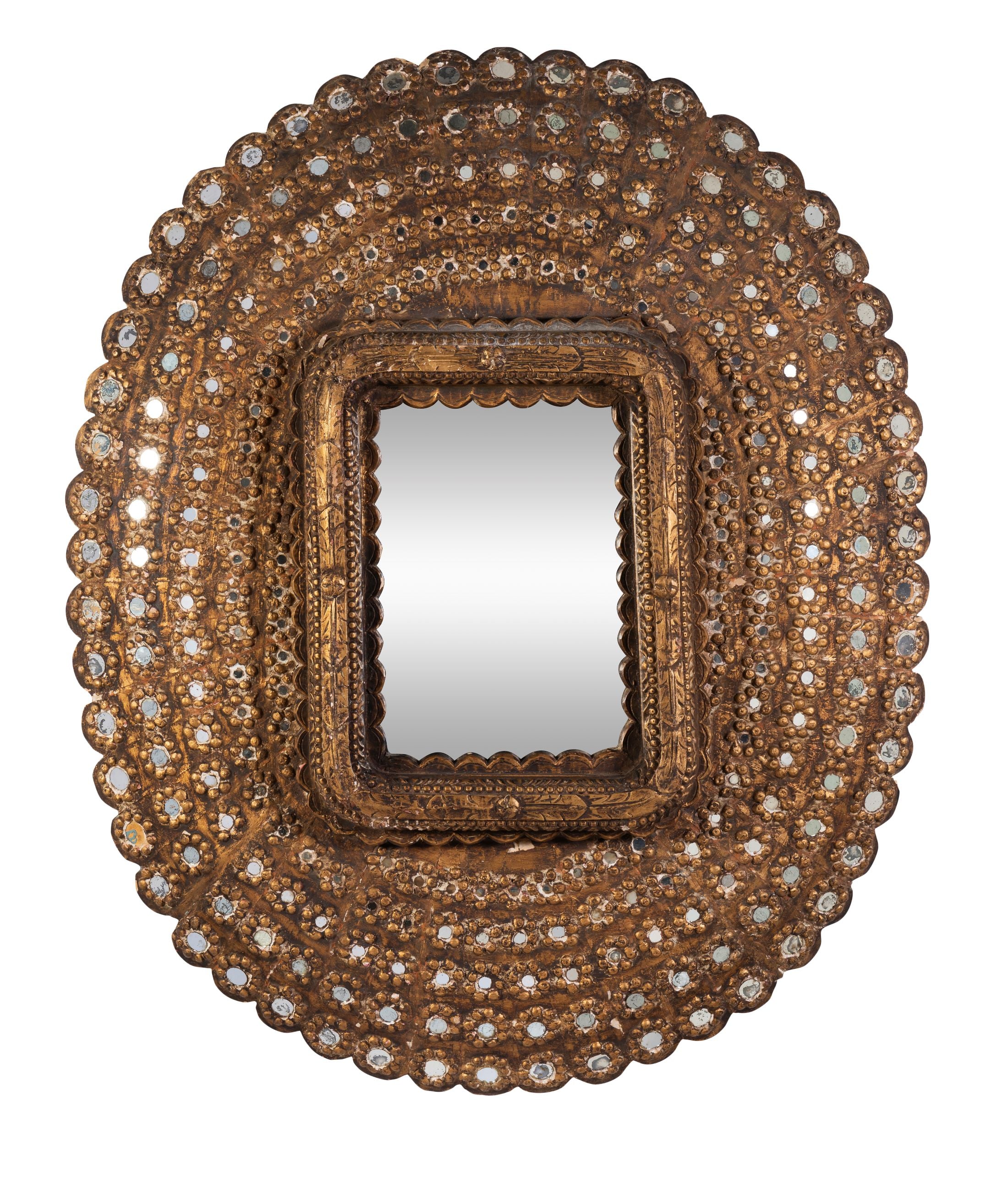 A Timber Peacock Mirror