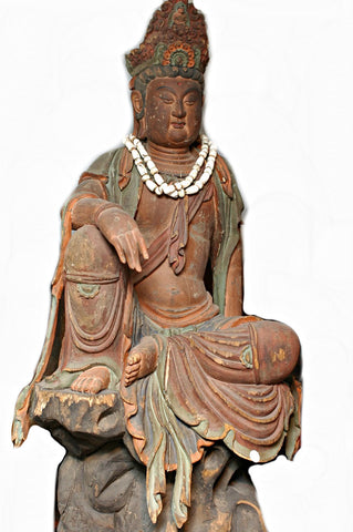 A Chinese Carved Wood Figure of Guanyin, Qing Dynasty (1644-1911), 18th century