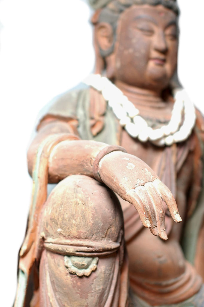 A Chinese Carved Wood Figure of Guanyin, Qing Dynasty (1644-1911), 18th century