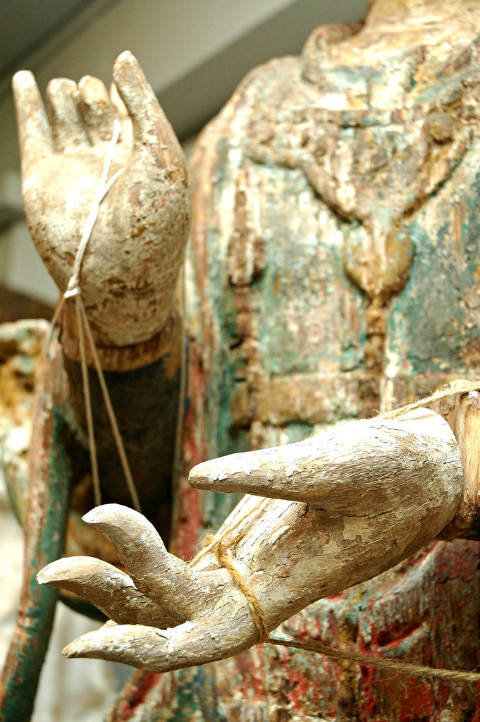A Chinese Carved Wood Figure of Guanyin Riding a Lion, Late Ming/Early Qing Dynasty
