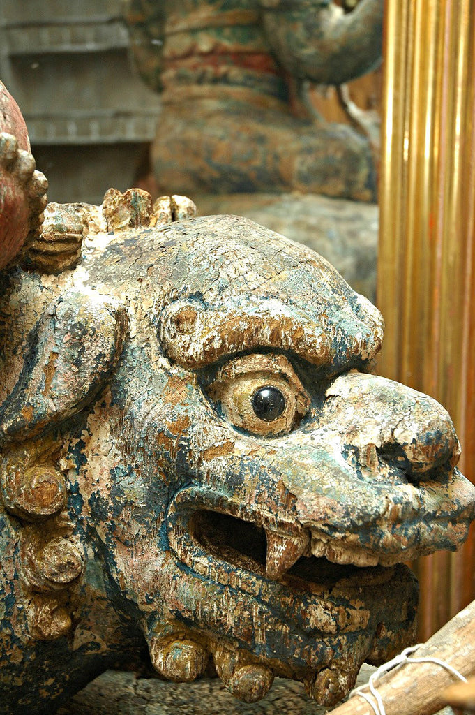 A Chinese Carved Wood Figure of Guanyin Riding a Lion, Late Ming/Early Qing Dynasty