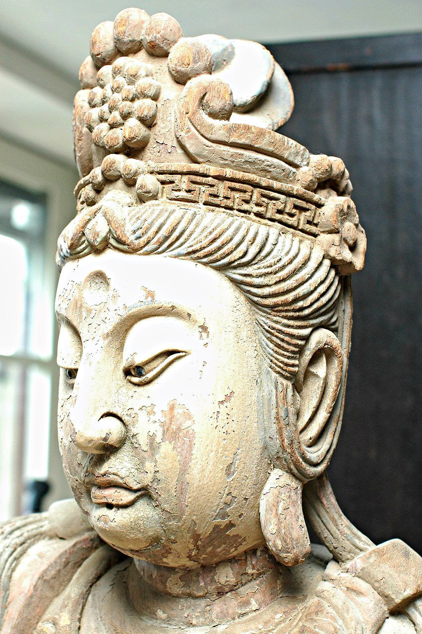 A Chinese Carved Wood Figure of Guanyin, Mid Ming Dynasty (circa 15th century)