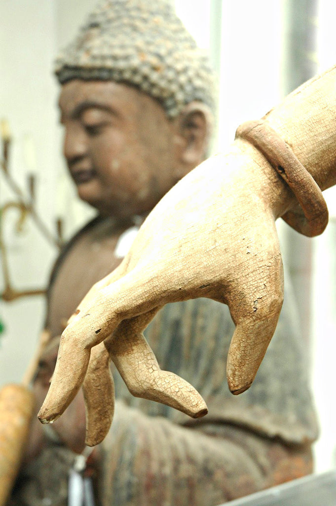 A Chinese Carved Wood Figure of Guanyin Riding a Qilin, Ming Dynasty (1368-1644)