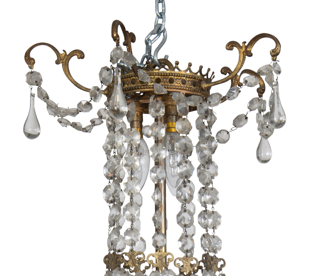 A Regency Style Eighteen-Light Brass and Cut-Glass Chandelier