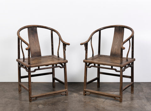 A Pair of Elm Chinese Yolk Back Armchairs