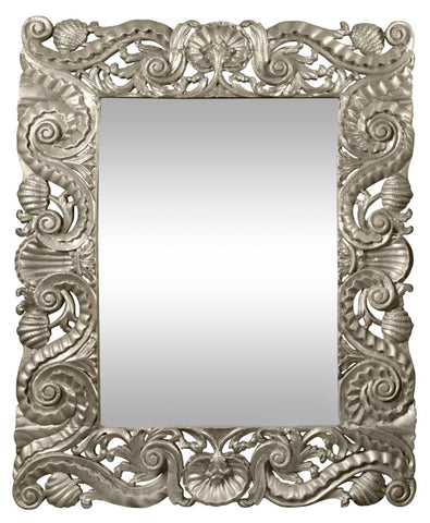 A Carved Timber Mirror with Pressed Metal Overlay