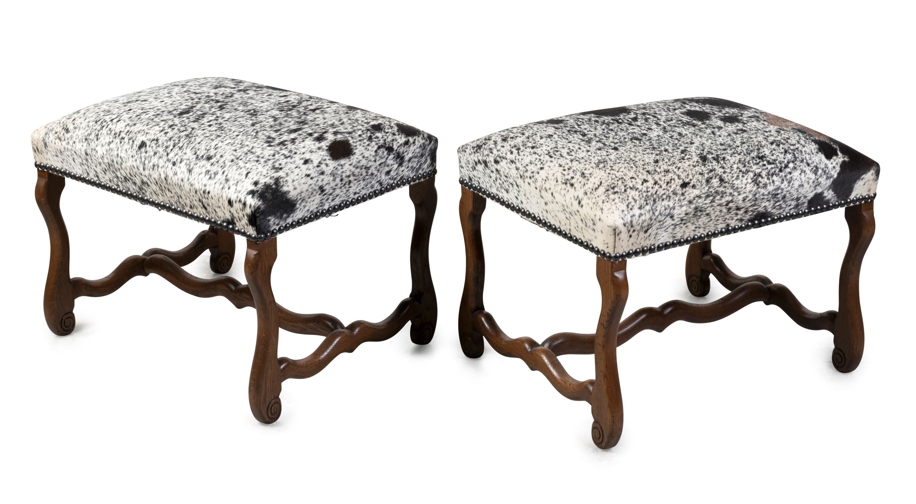 A Pair of Louis Treize Style Ottomans Upholstered in Hide