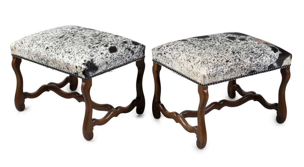 A Pair of Louis Treize Style Ottomans Upholstered in Hide