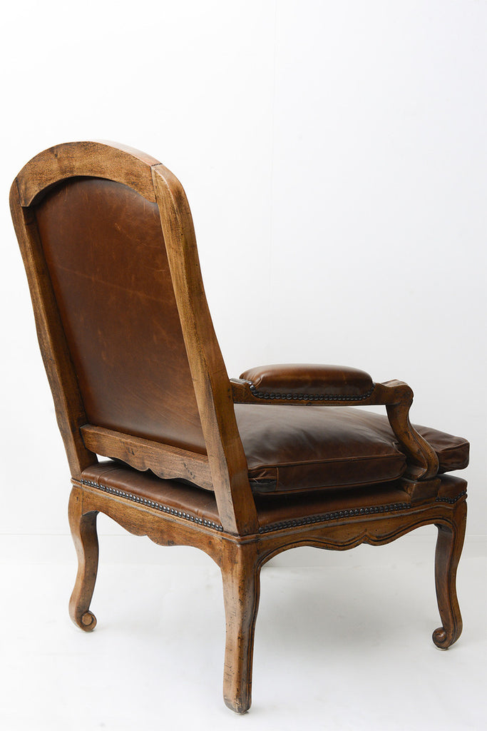 A French Leather Upholstered Walnut Framed Fauteuils