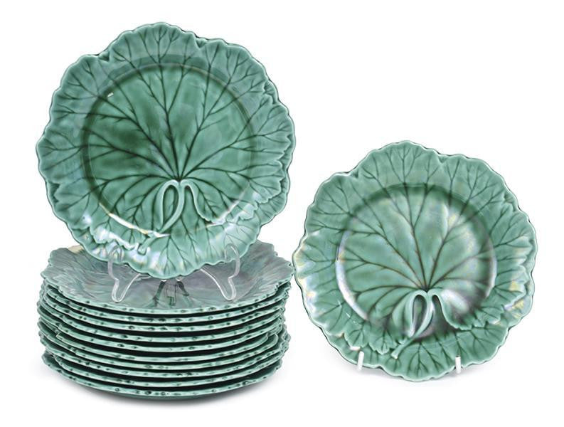 A Collection of Twelve Wedgwood Green Majolica Glazed Plates