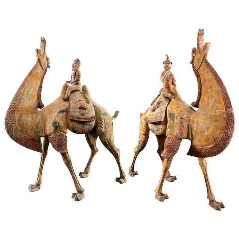 A Pair of Tang Dynasty Chinese Terracotta Bactrian Camels with Riders