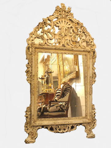 A Pair of Ornately Carved Louis XV Style Mirrors