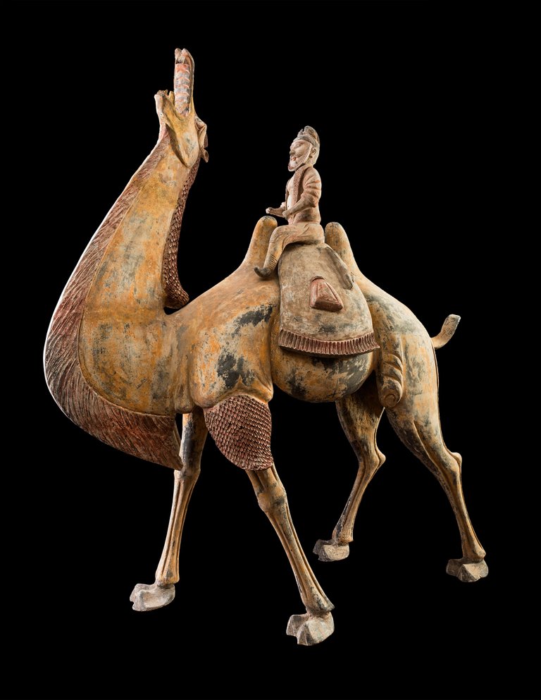A Pair of Tang Dynasty Chinese Terracotta Bactrian Camels with Riders