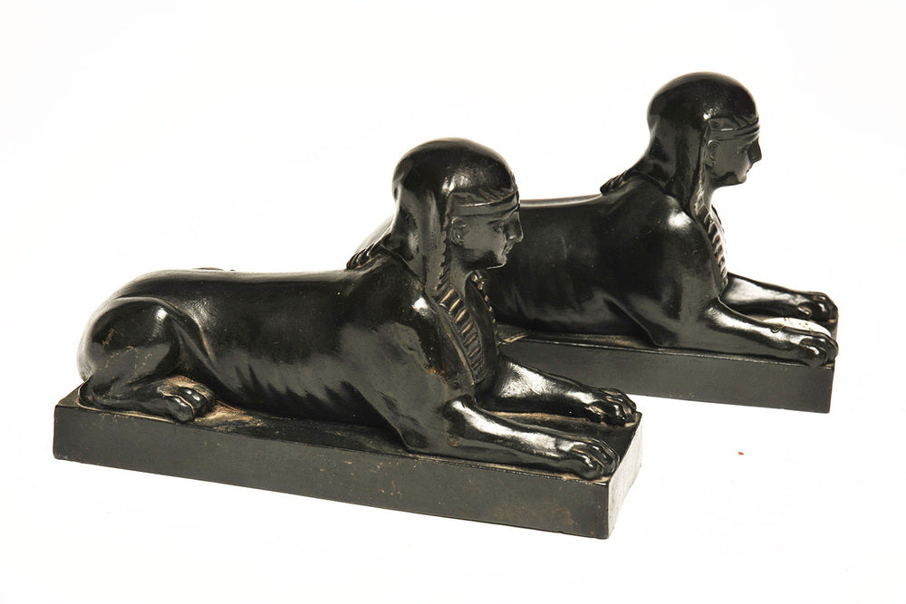 A Pair of Glazed Basalt Jasper Sphinx Paperweights, Early 19th Century