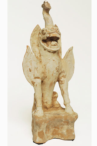A Chinese Unglazed Pottery Guardian Spirit, Tang Dynasty