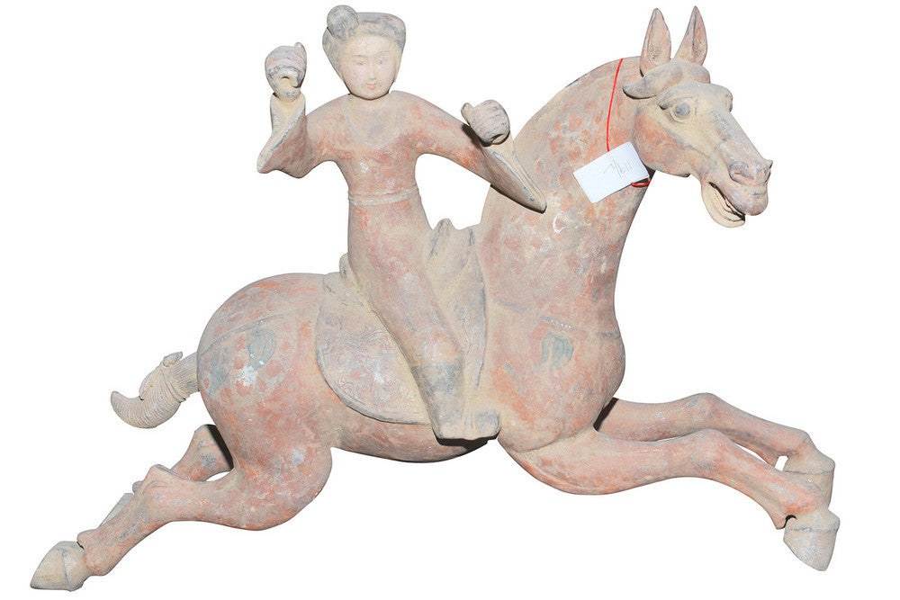A Chinese Pottery Equestrian Model of a Polo Player, Tang Dynasty
