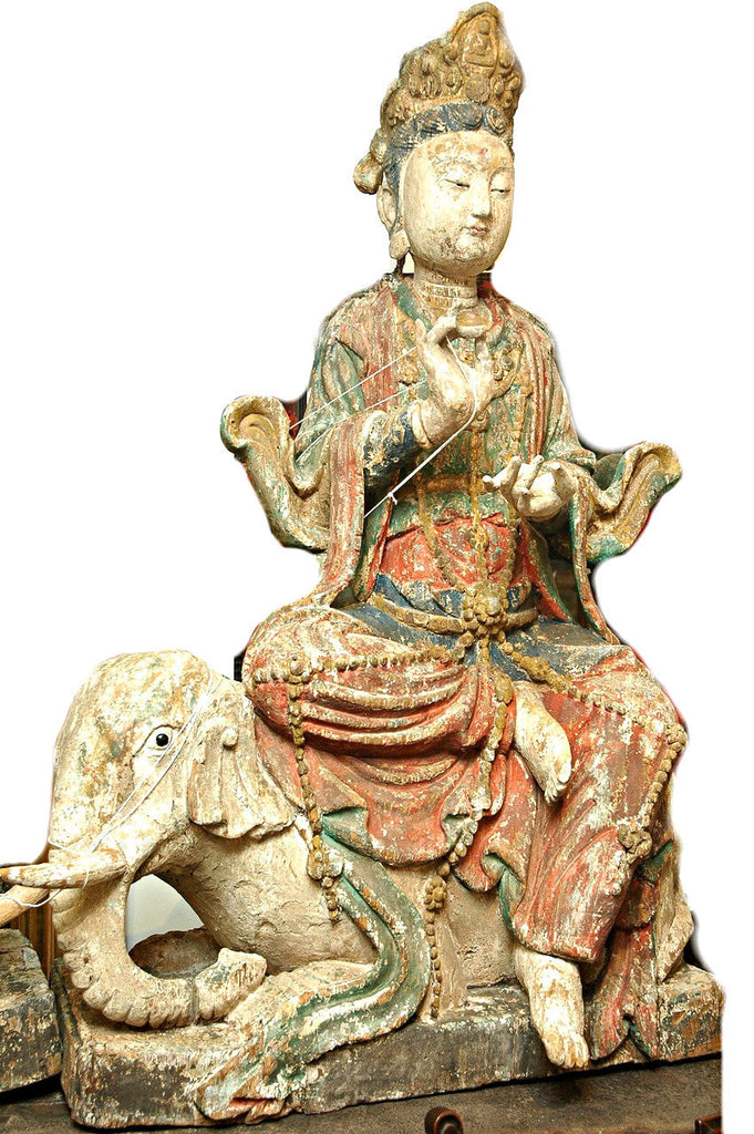 A Chinese Carved Wood Figure of Guanyin Riding an Elephant, Late Ming/Early Qing Dynasty