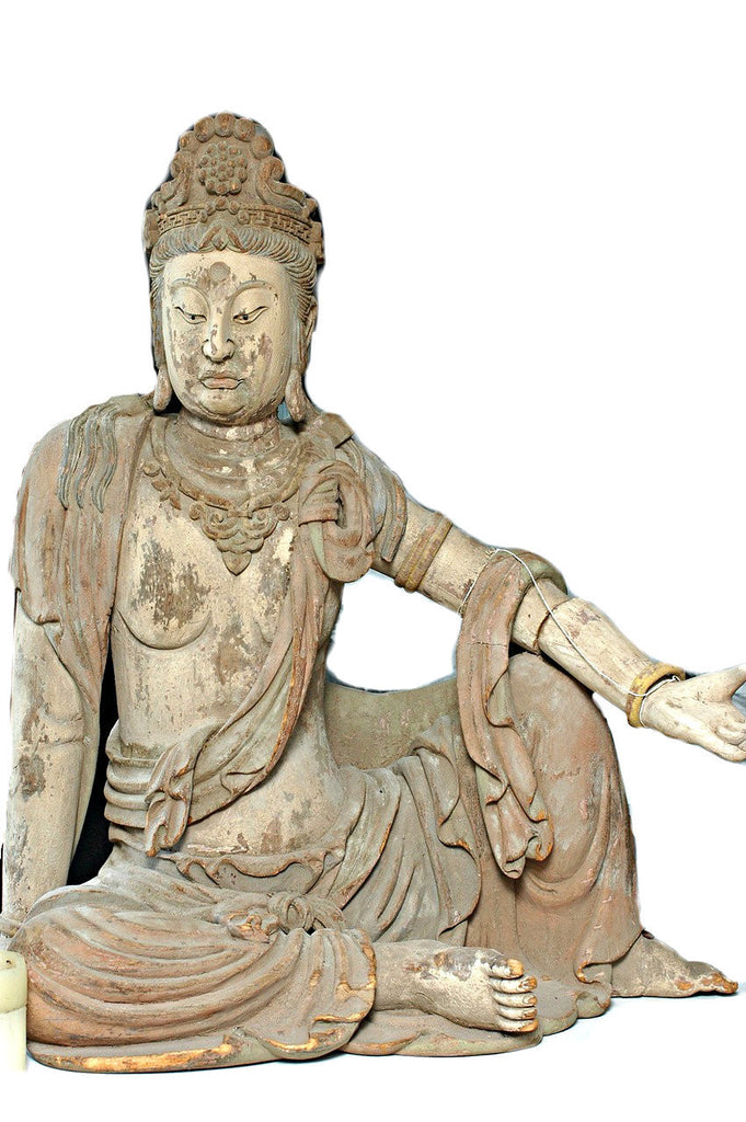 A Chinese Carved Wood Figure of Guanyin, Mid Ming Dynasty (circa 15th century)