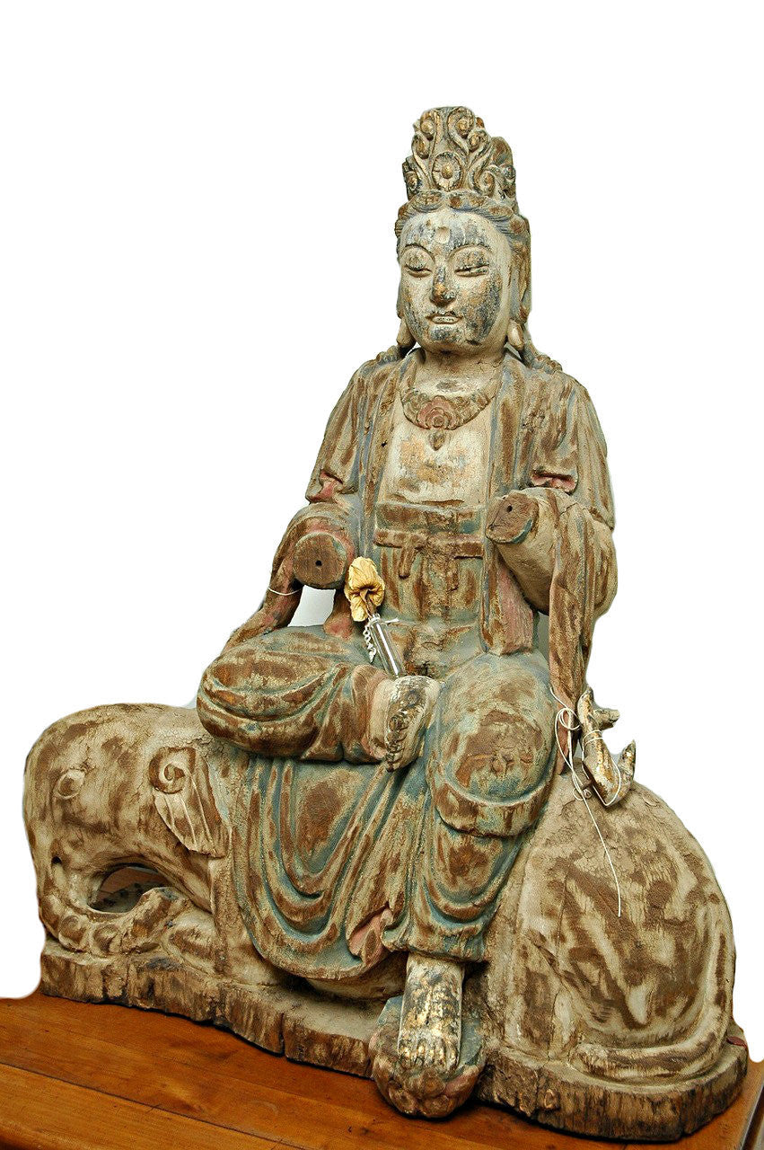 A Chinese Carved Wood Figure of Guanyin Riding an Elephant, Late Ming Dynasty (1368-1644)