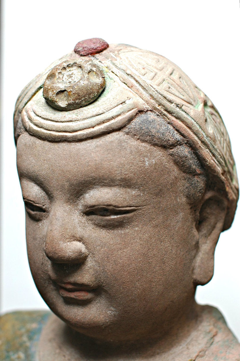A Rare Chinese Painted and Carved Sandstone Figure of Guanyin,  Southern Song Dynasty (1127-1279)