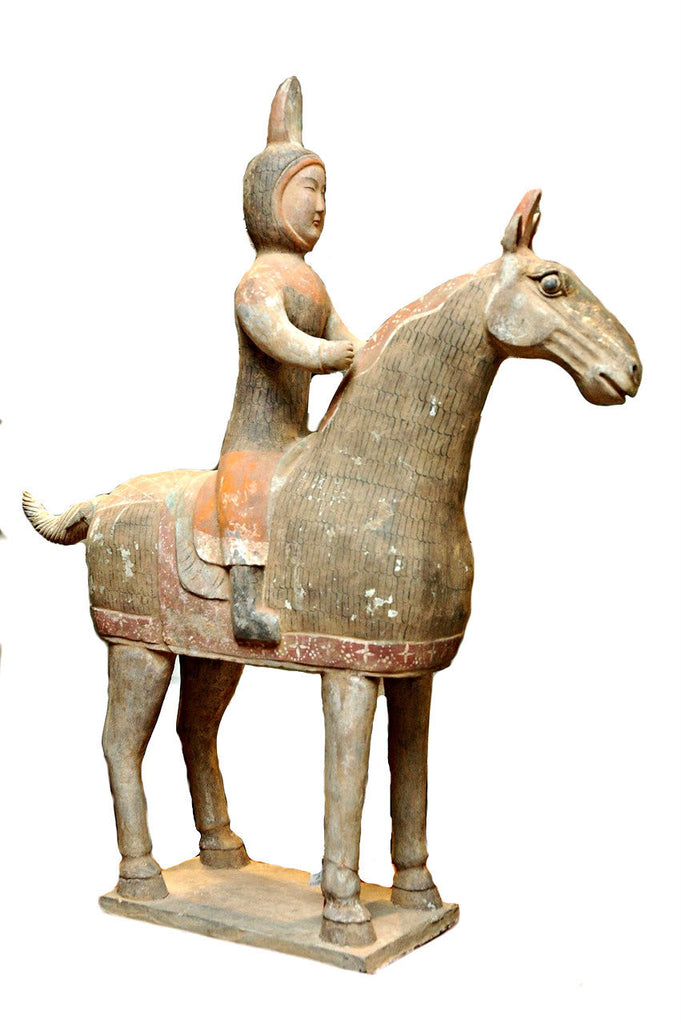 A Chinese Painted Pottery Equestrian Figure  Tang Dynasty (618-906 A.D.)